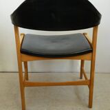 Danish armchair in oak and black leather