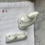 White porcelain coat hooks
