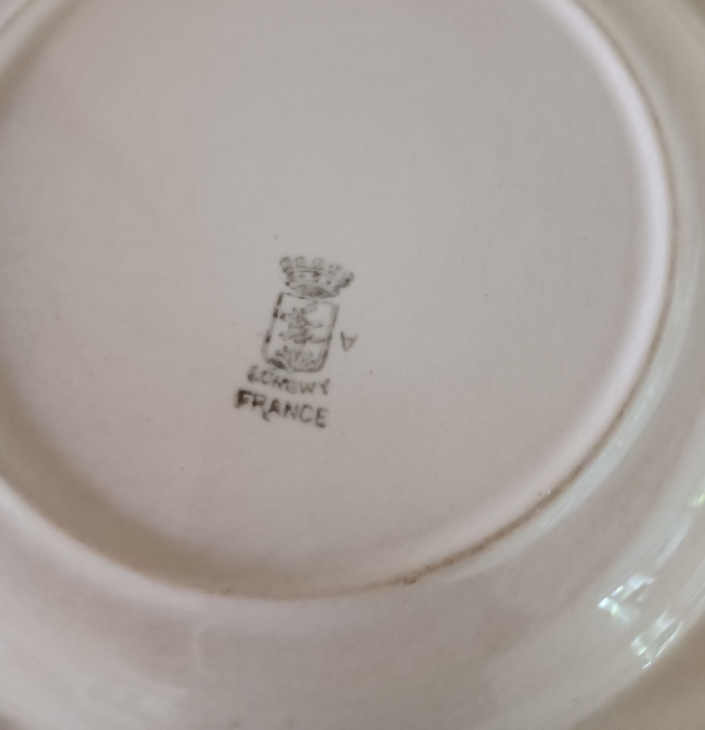 5 assiettes terre de fer Longwy