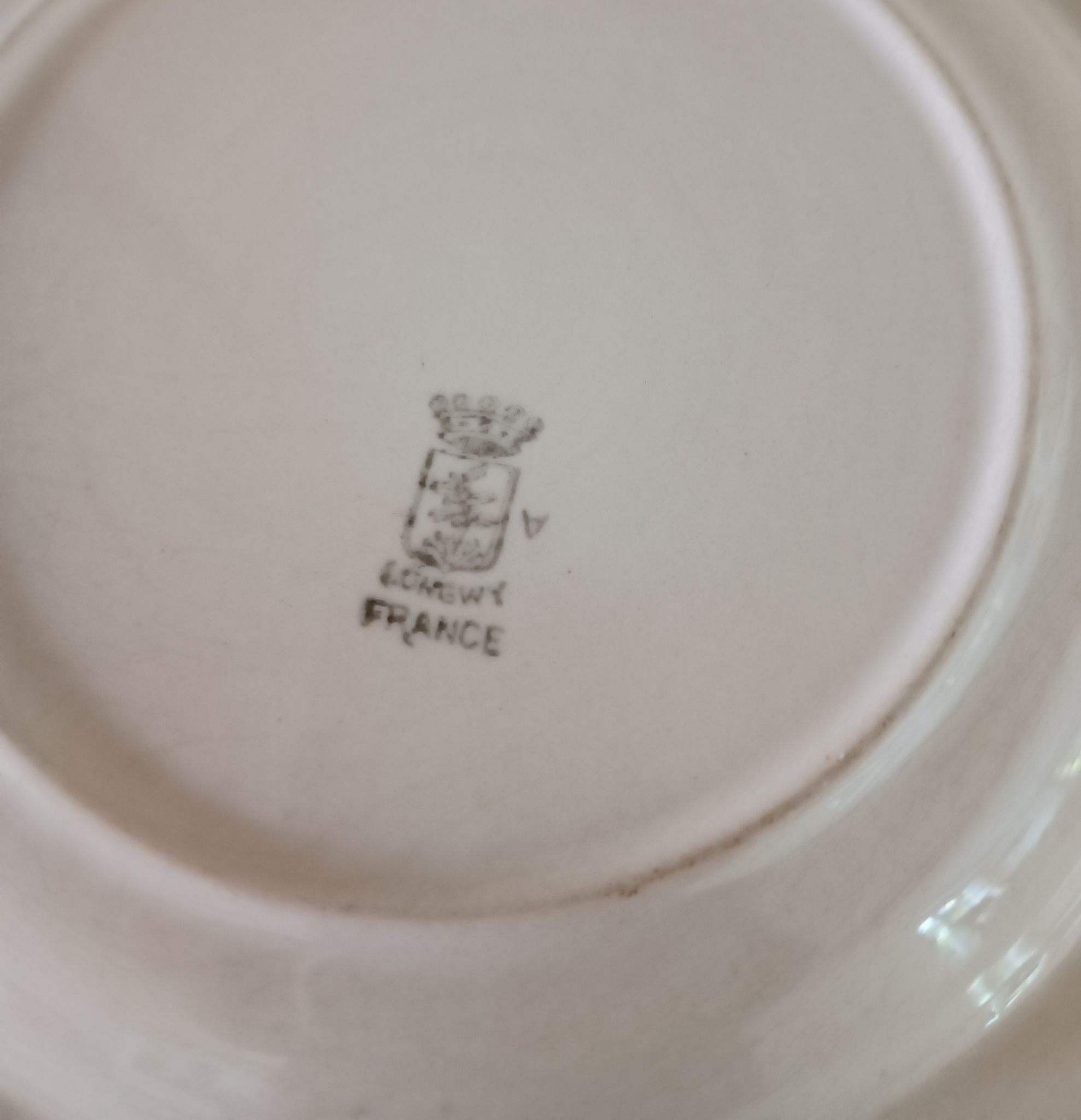 5 assiettes terre de fer Longwy