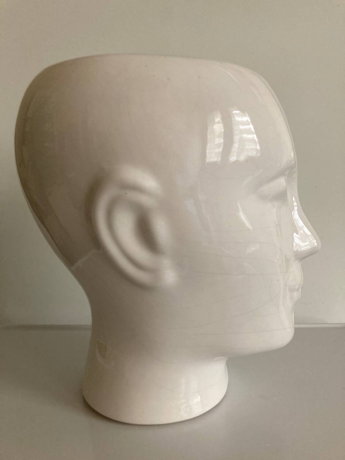 Vintage white ceramic face-shaped vase or planter