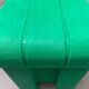 Postmodern plastic stool with a wood effect.