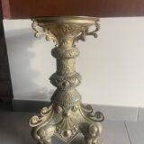 Large bronze candlestick with tripod and winged dog decoration, 19th century.