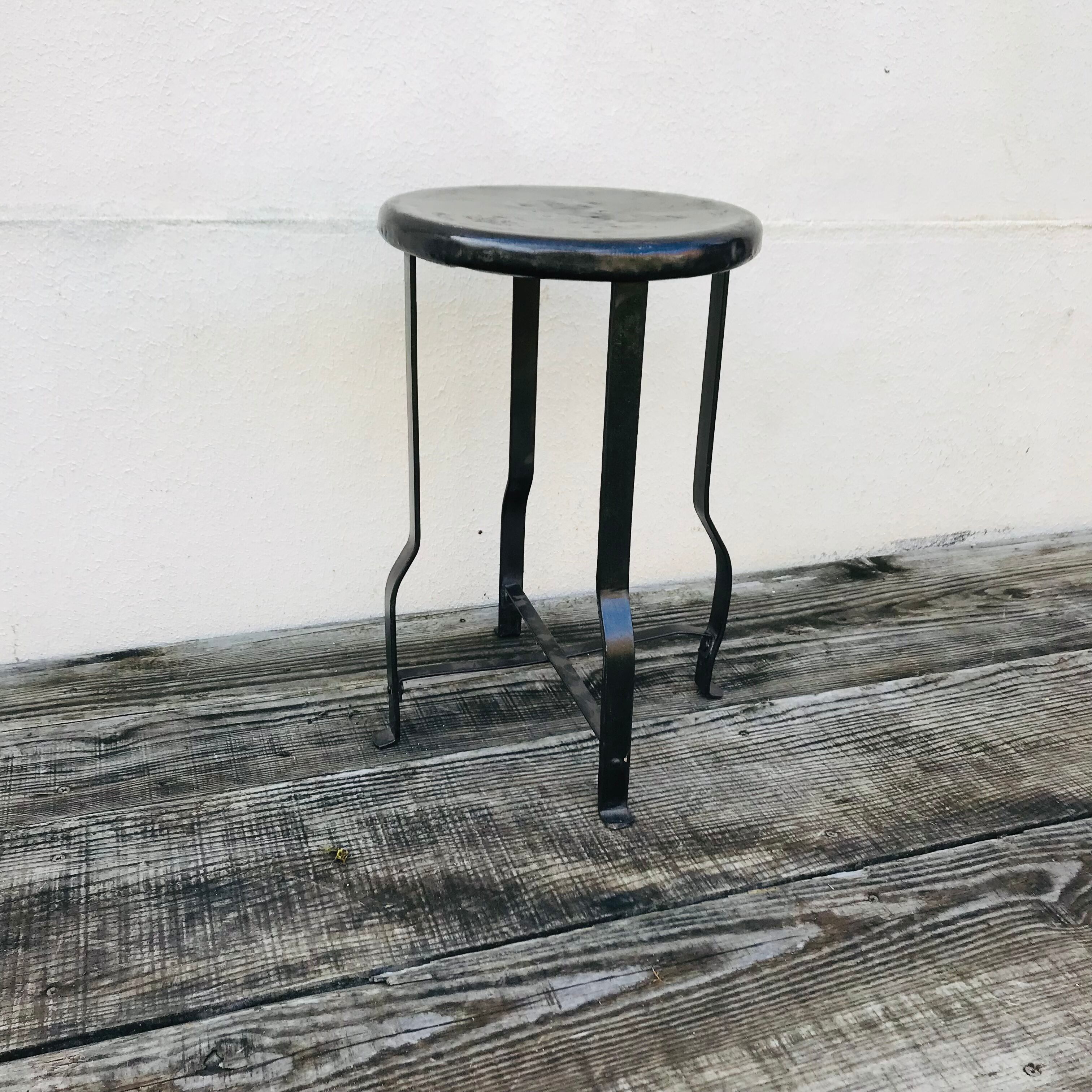 Vintage riveted metal bottom stool 1930