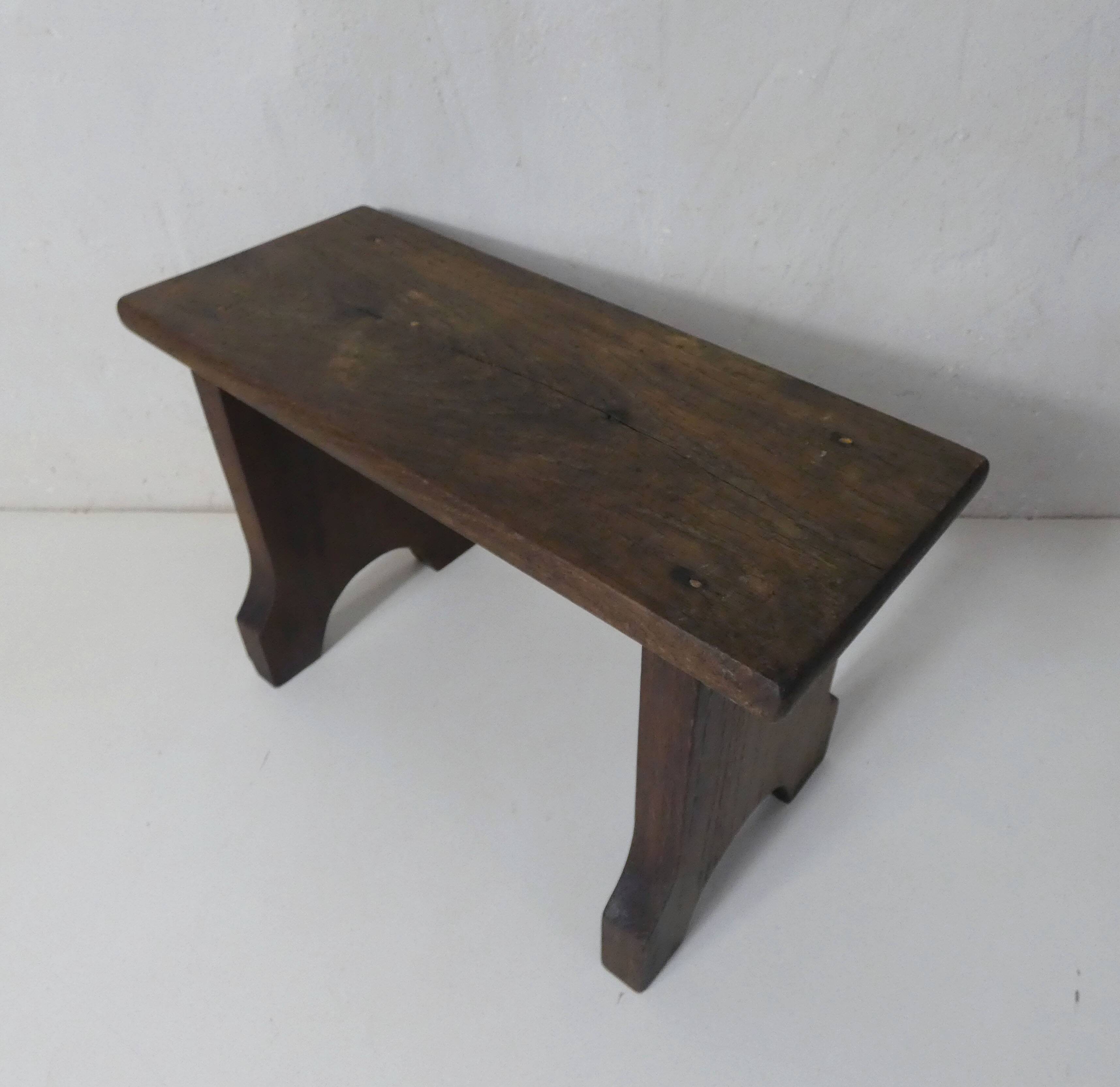 old small wooden bench step