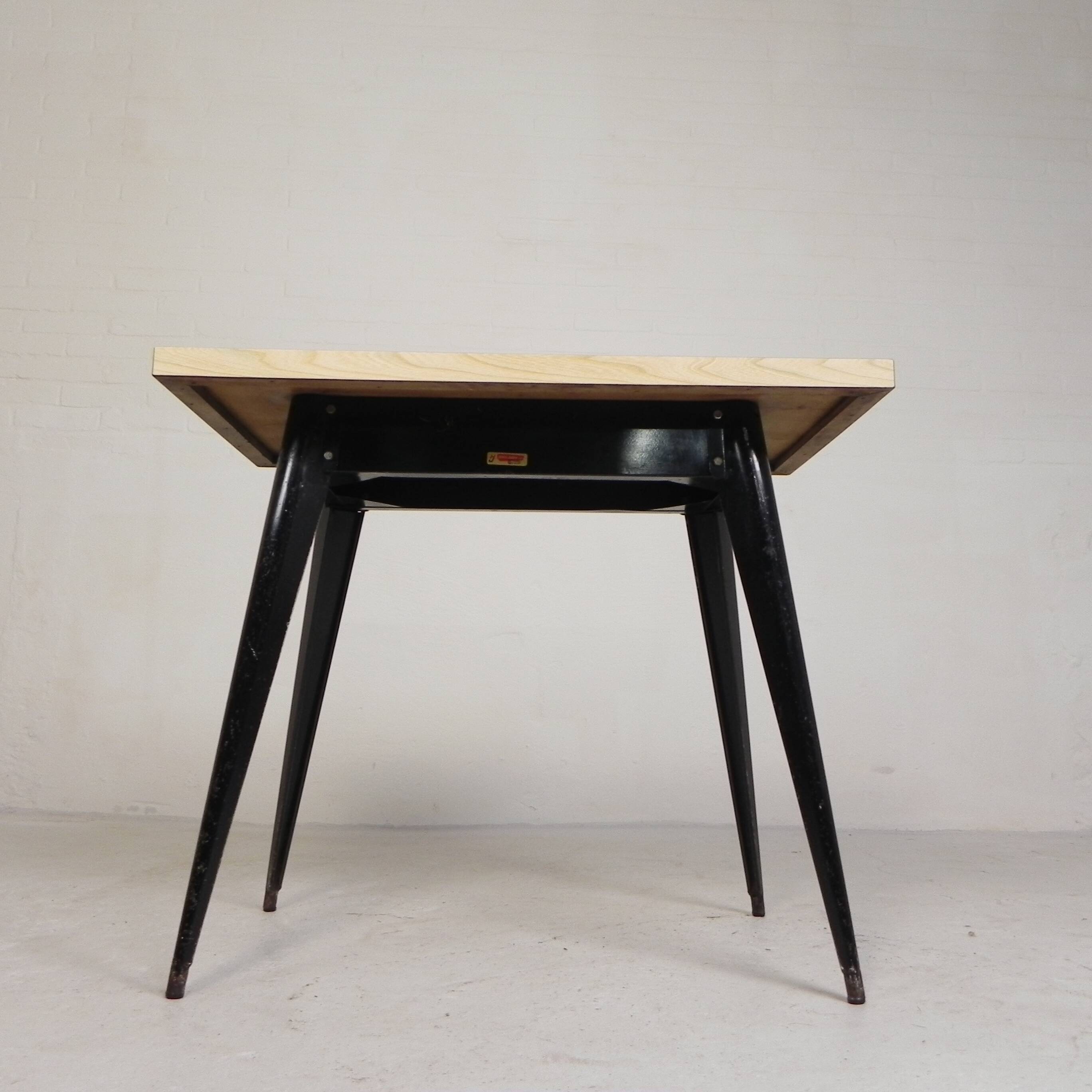 Bistro table Henri Julien, model Tolix T55 with a Formica top, 1950s.