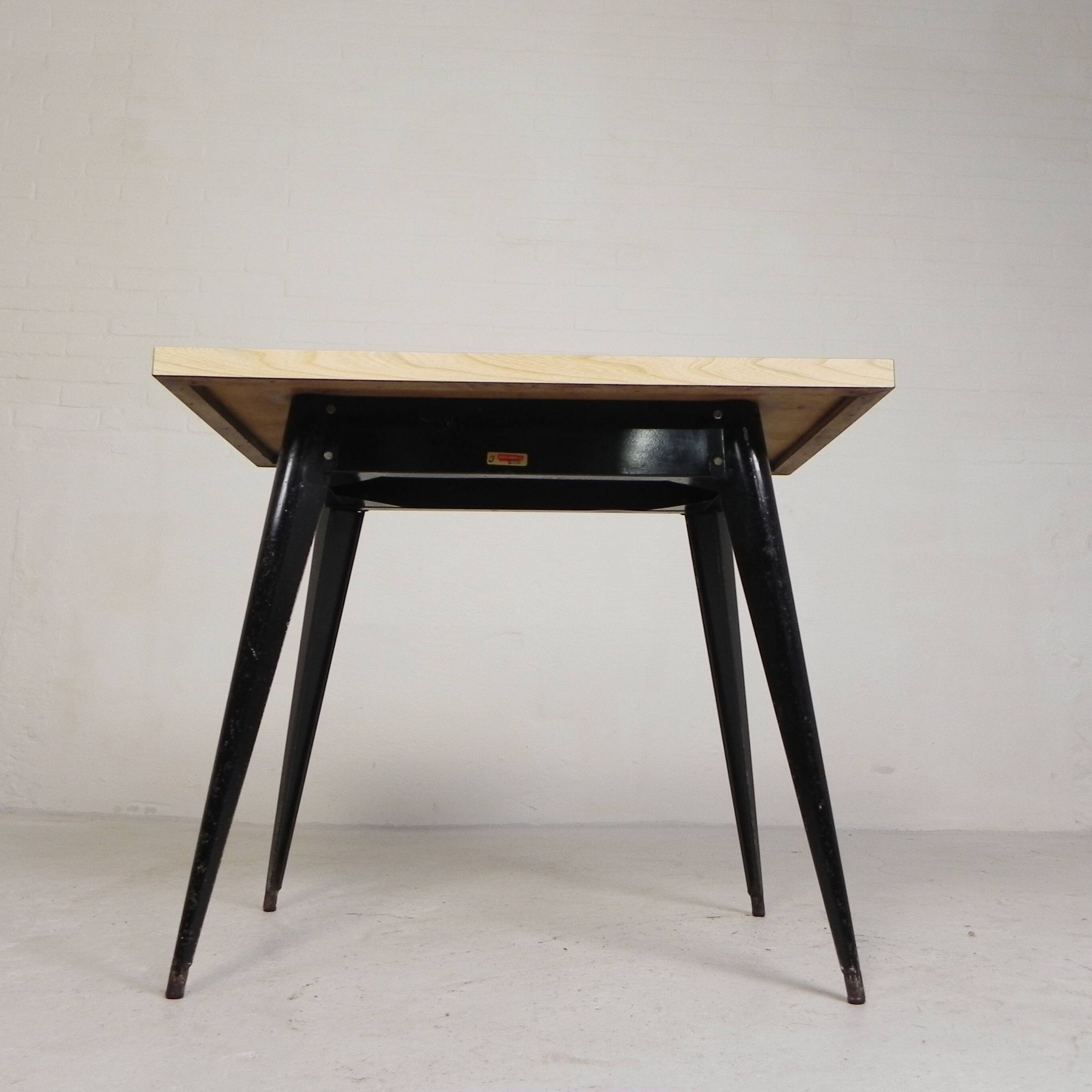 Bistro table Henri Julien, model Tolix T55 with a Formica top, 1950s.
