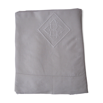 Old sheet in monogram white thread