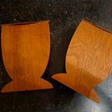 Bookends in exotic wood marquetry in the shape of a tambourine.