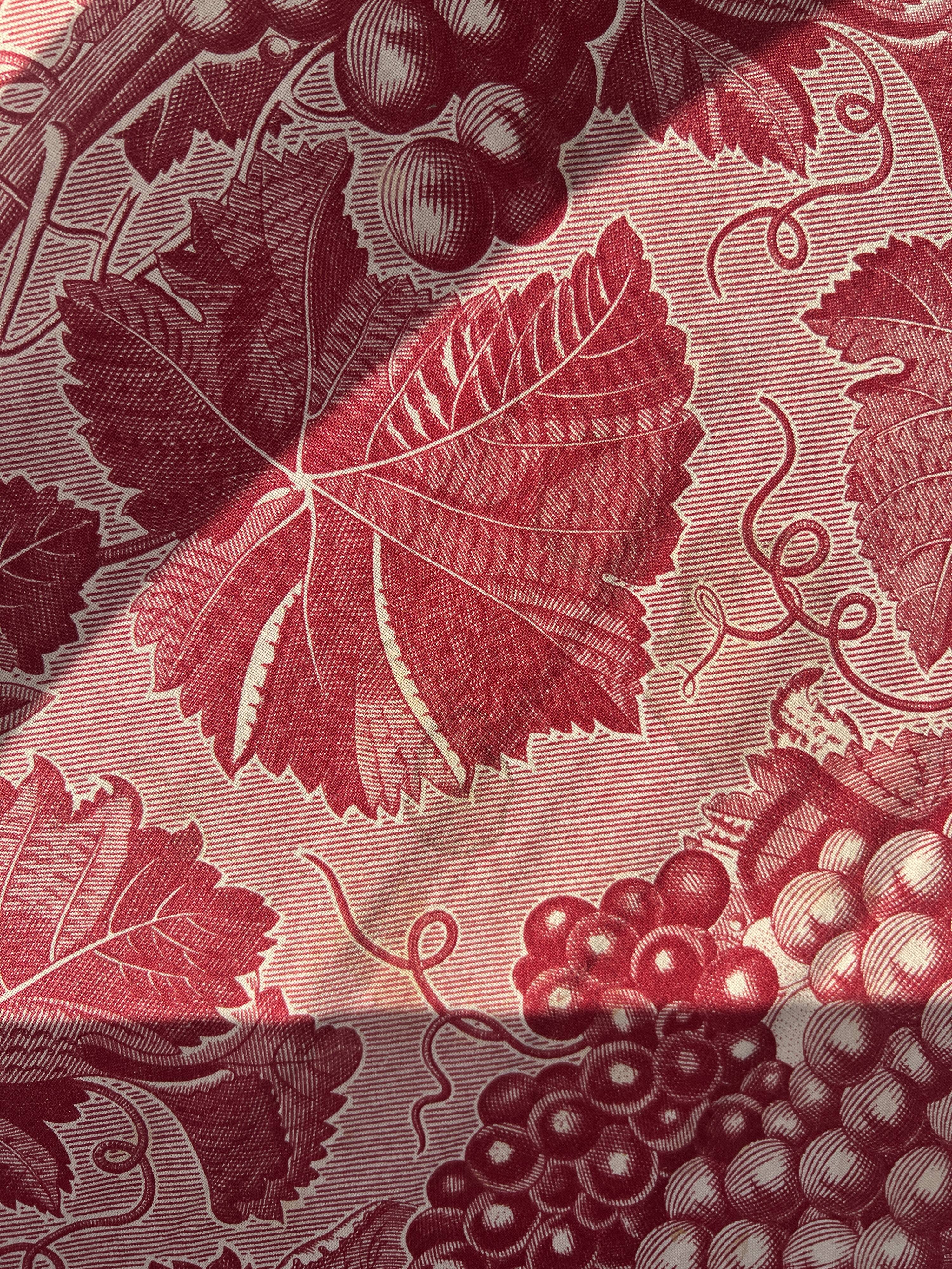 pair of rustic wood and fabric armchairs