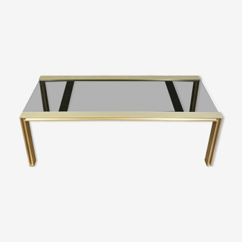 Table basse design en métal doré et verre teinté