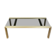 Table basse design en métal doré et verre teinté