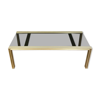 Design coffee table in gilded metal and tinted glass