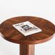 Art Deco style pedestal table in walnut wood veneer. France, 40's