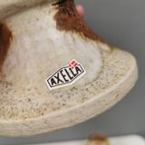 A set of ceramic candleholders by Axel Larsen for his own company, Axella