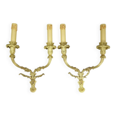 Large pair of Louis XVI style wall sconces from the 19th century - gilded bronze.