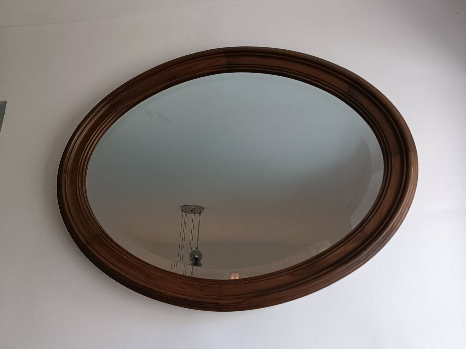 Antique oval beveled mirror