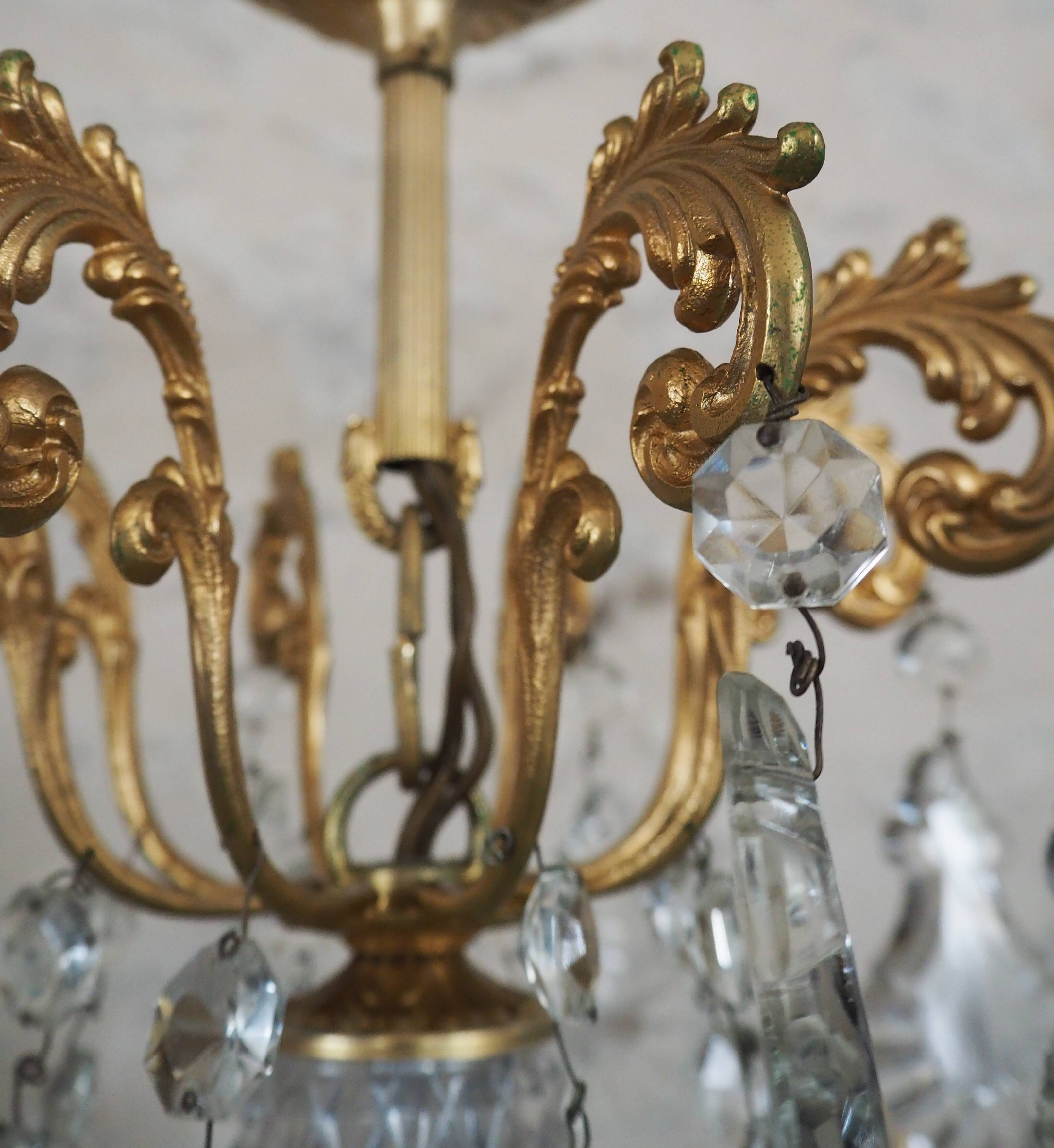 Chandelier 12 lamps with grapevines in crystal, bronze and regulated