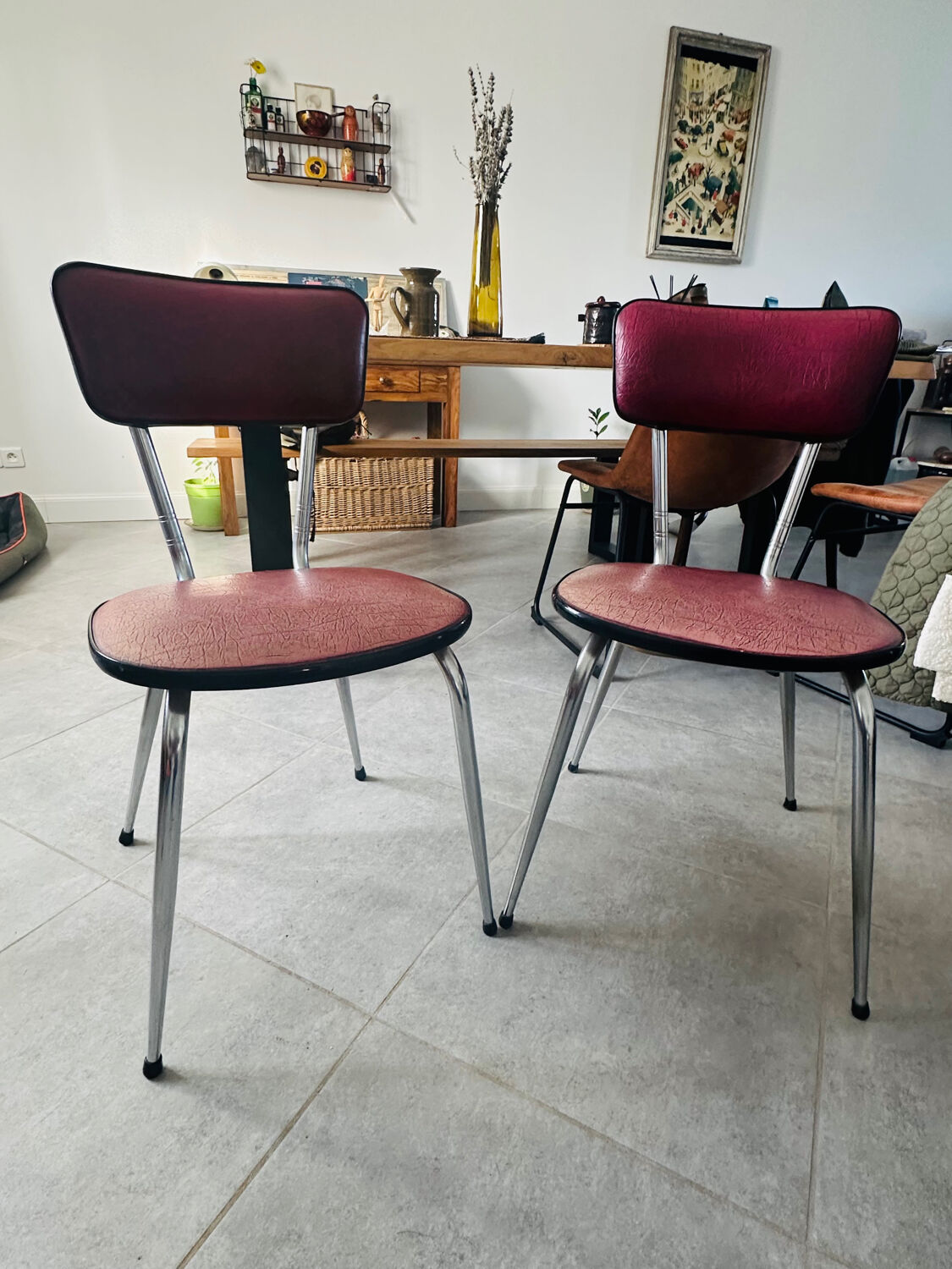 Pair of raspberry-colored chairs from the 60s/70s with metal legs