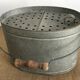 Old zinc stud, fisherman's live bucket