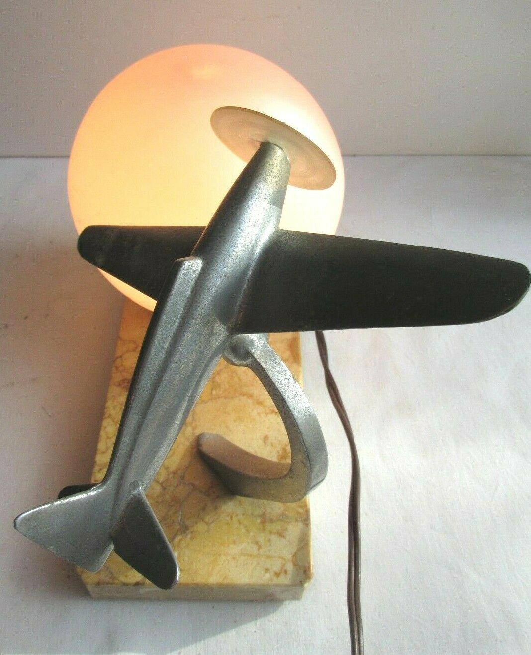 Art deco table lamp aluminum airplane and ball tulip on marble terrace