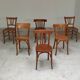 Set of 6 mismatched blond wood bistro chairs
