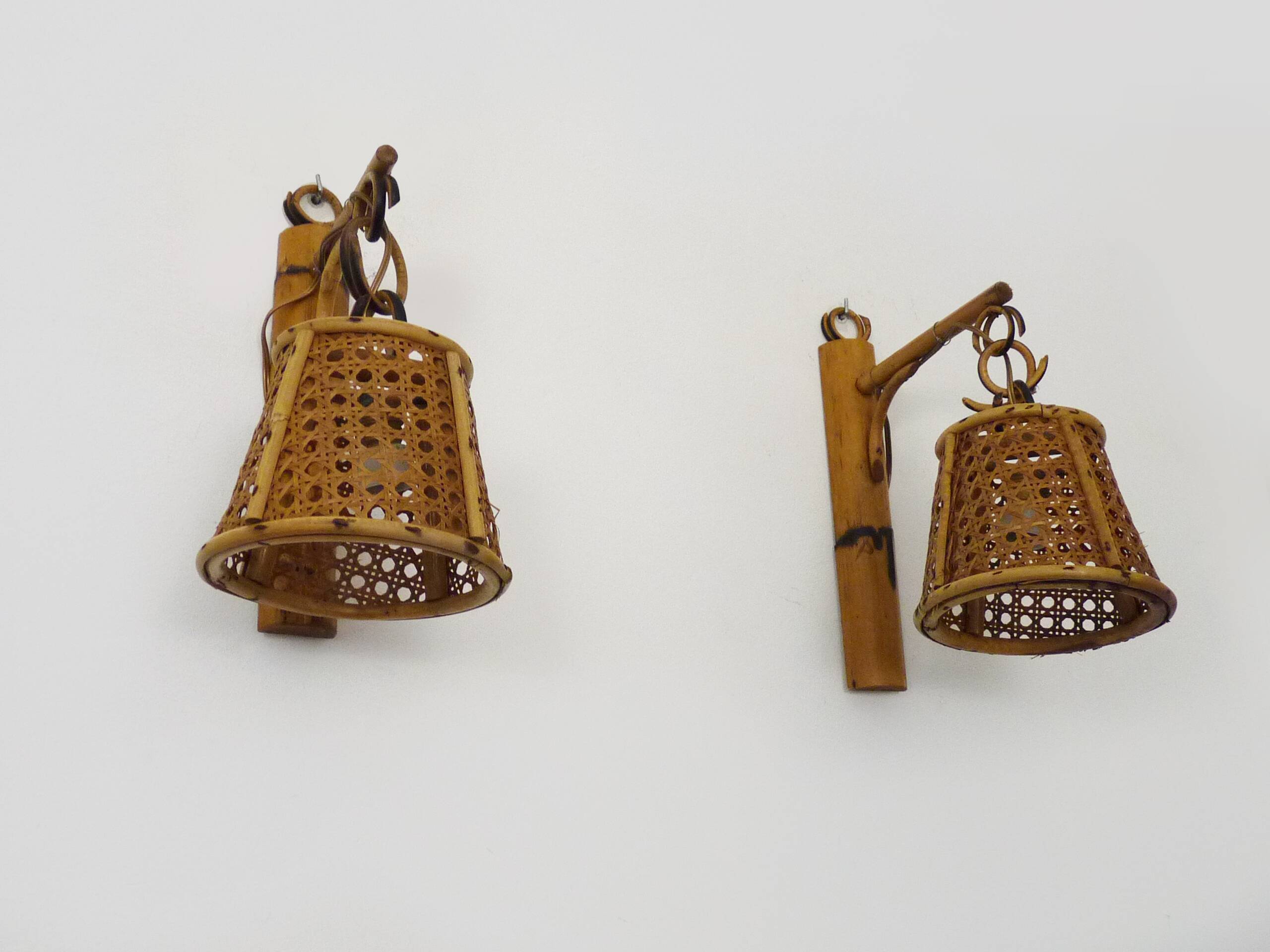 Pair of rattan and cane lantern wall lights. 1950s-1960s