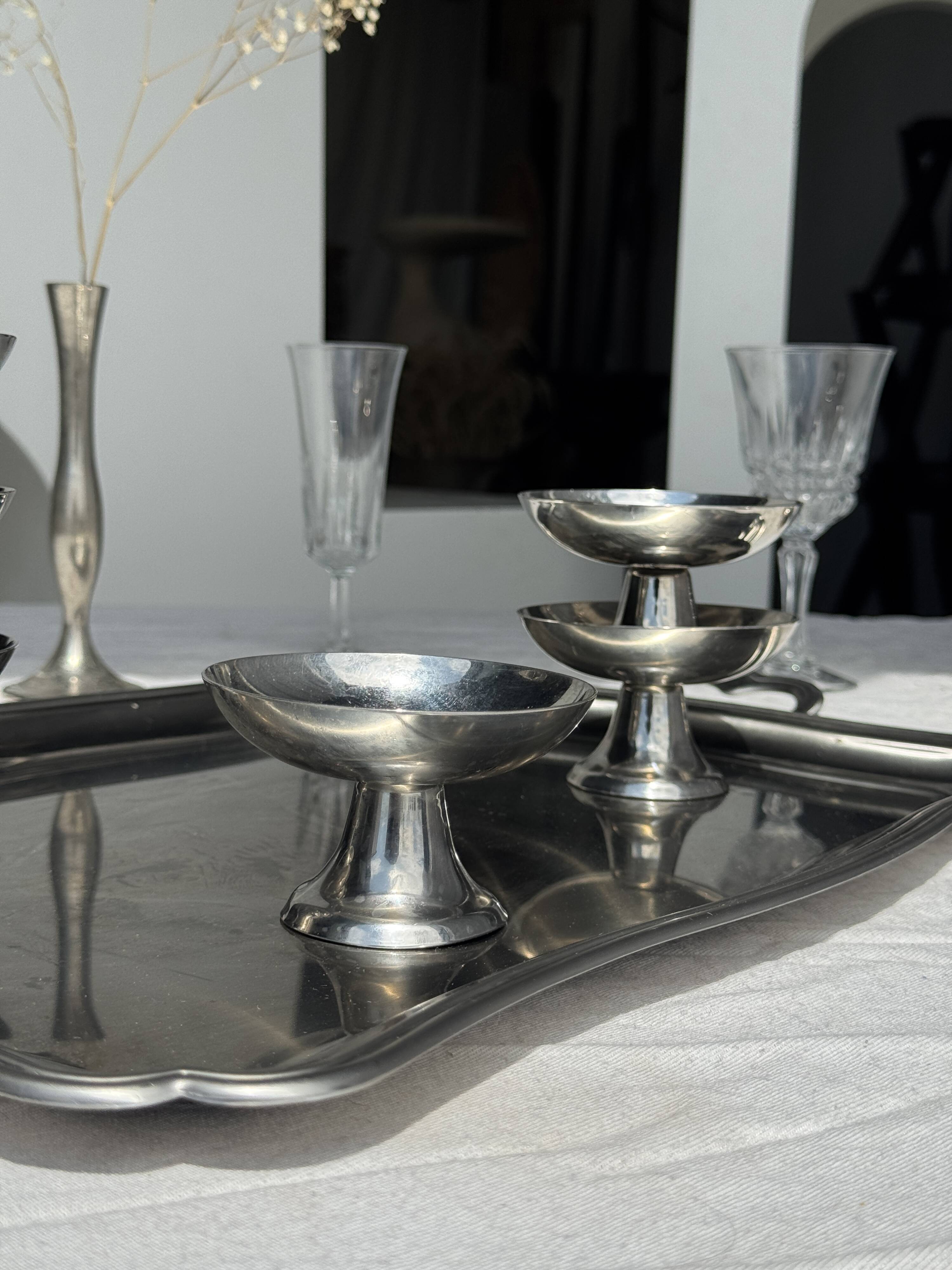 Guy Degrenne silver stainless steel serving tray with an eventful shape