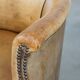 Antique sheep leather club chair/armchair on wheels