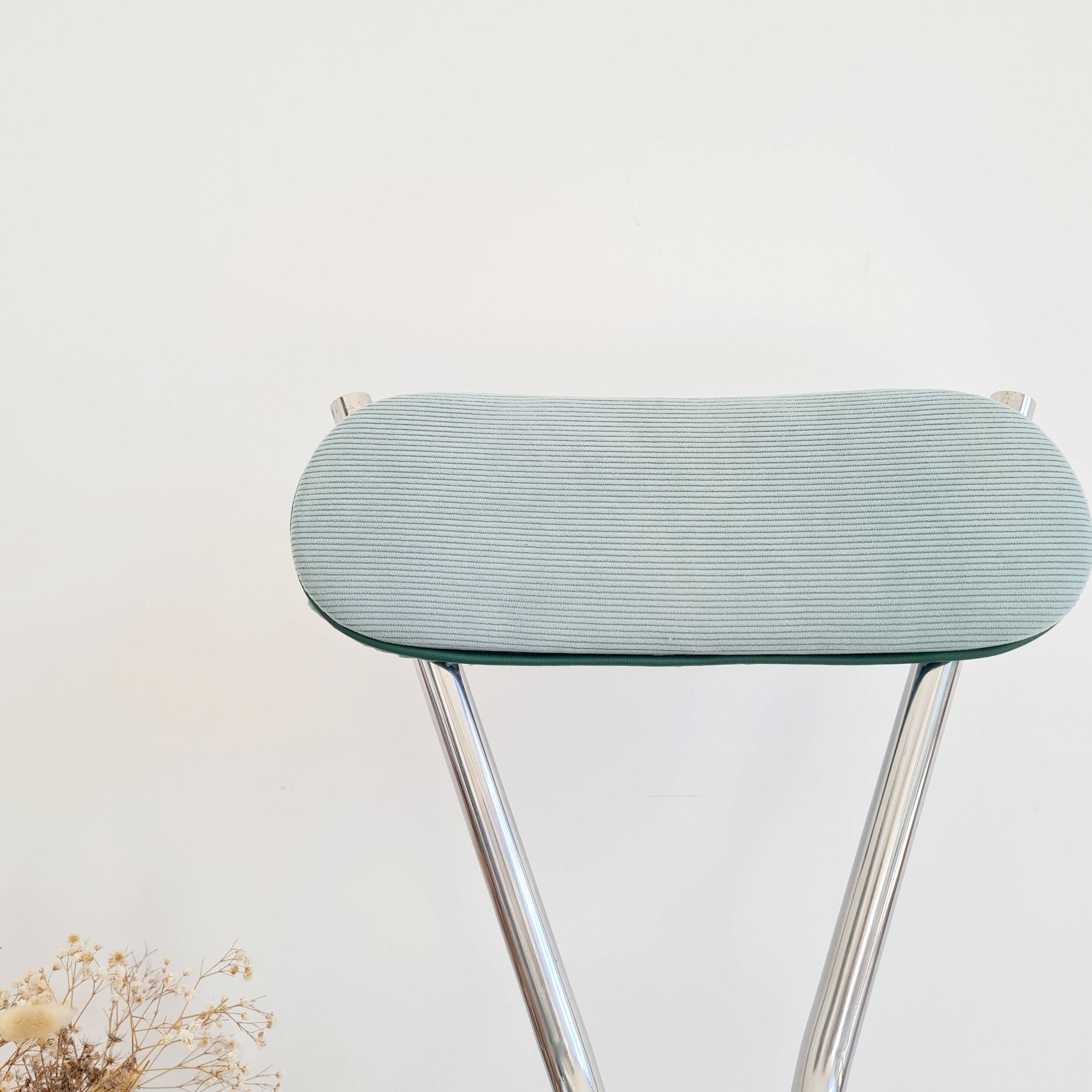 Old chrome metal and blue velvet chair
