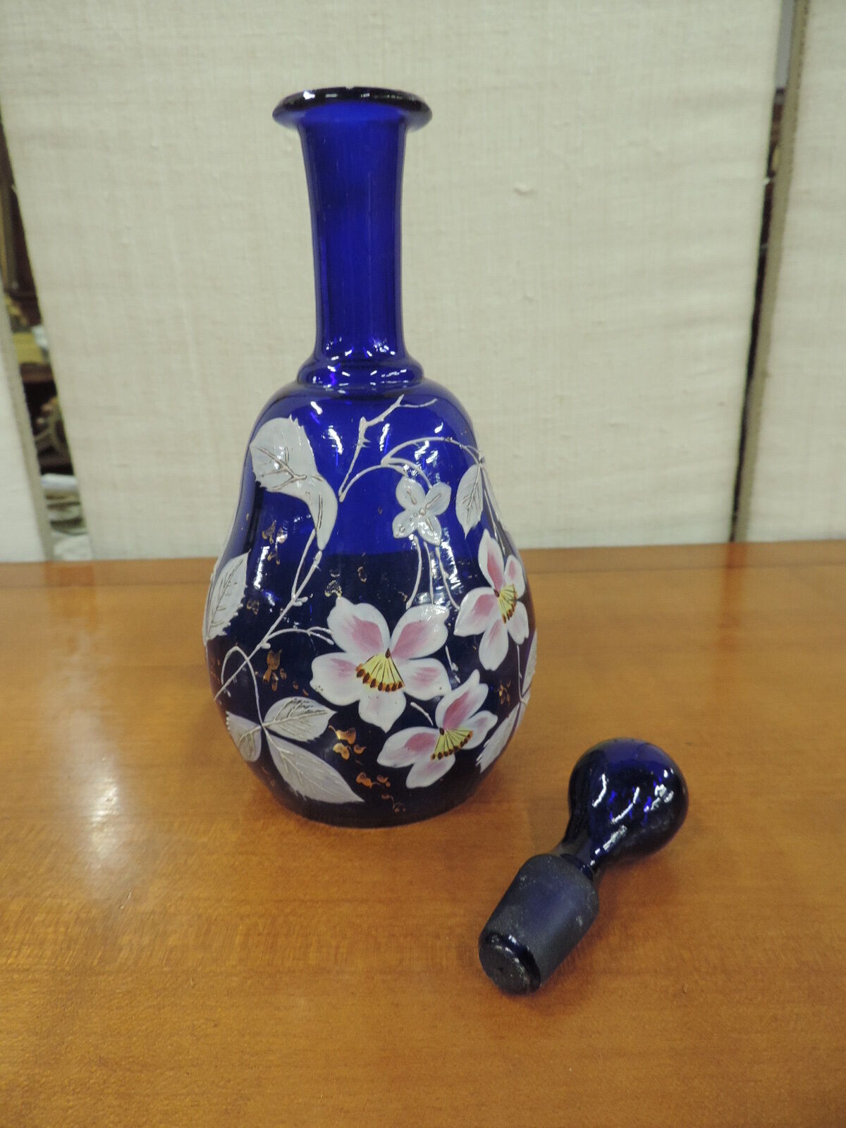 Blue liquor enamelled decanter
