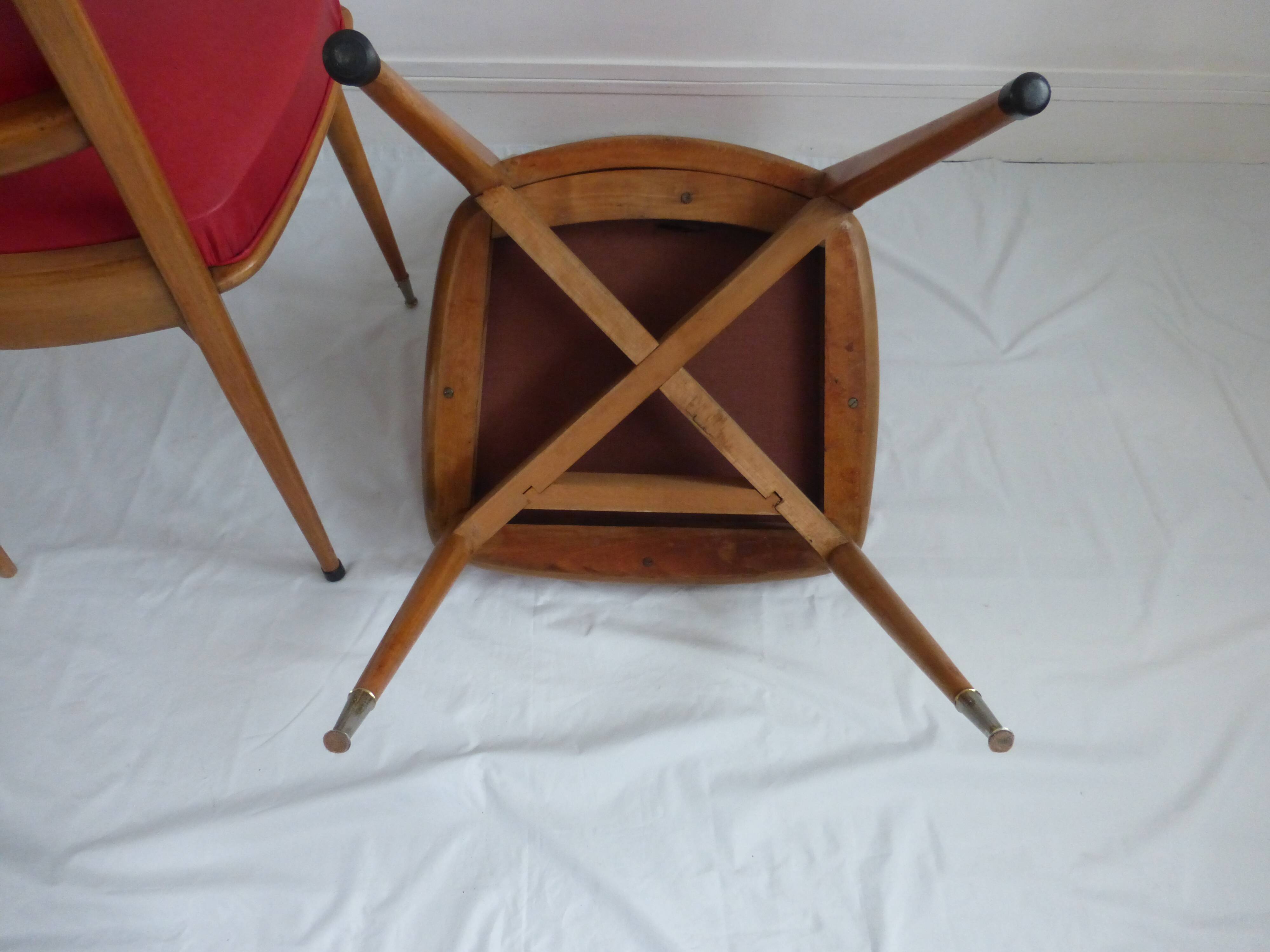 Set of five 50s wooden and red skai chairs