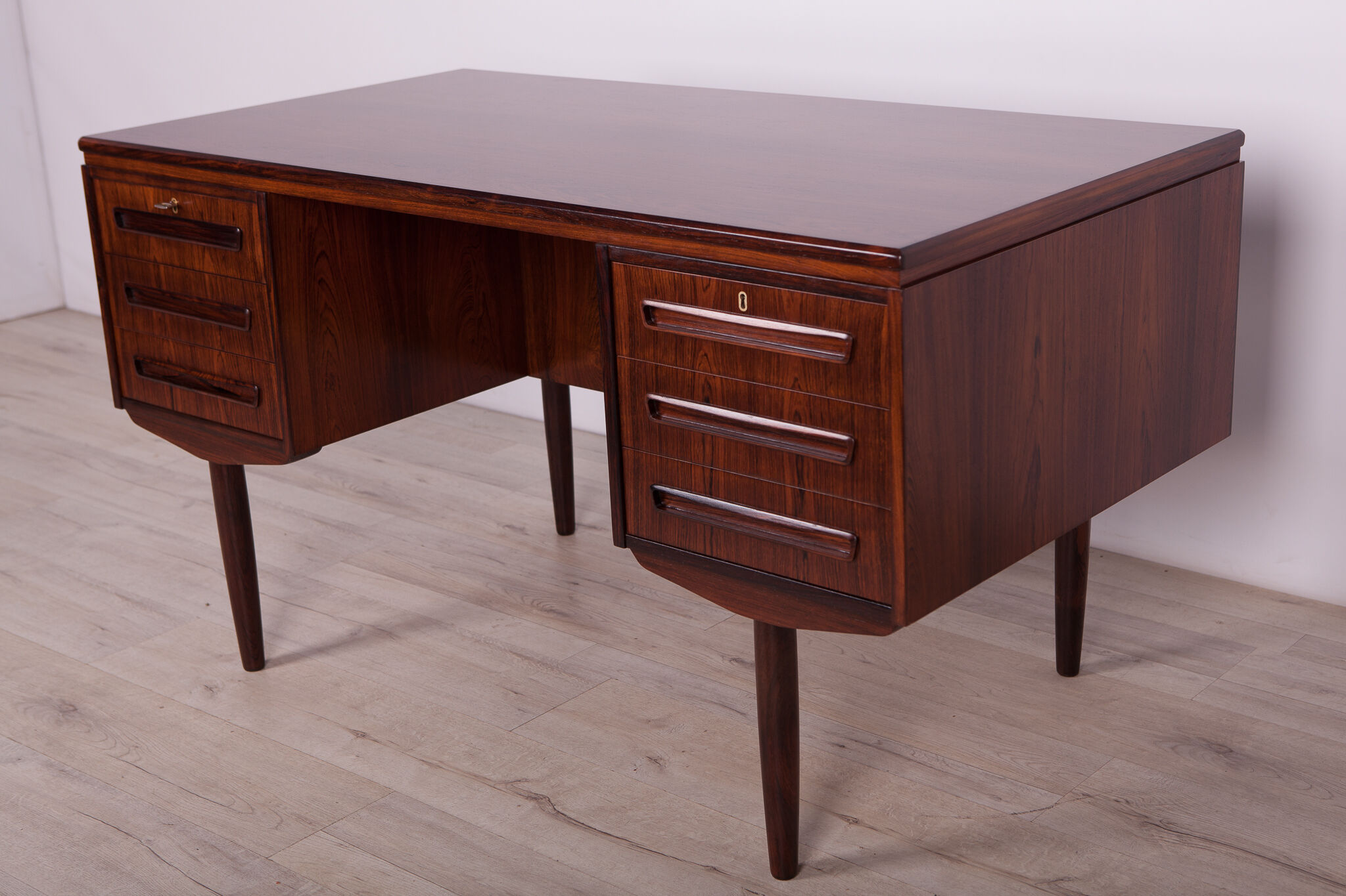 Rosewood desk by J. Svenstrup for A.P Mobler, 1960s