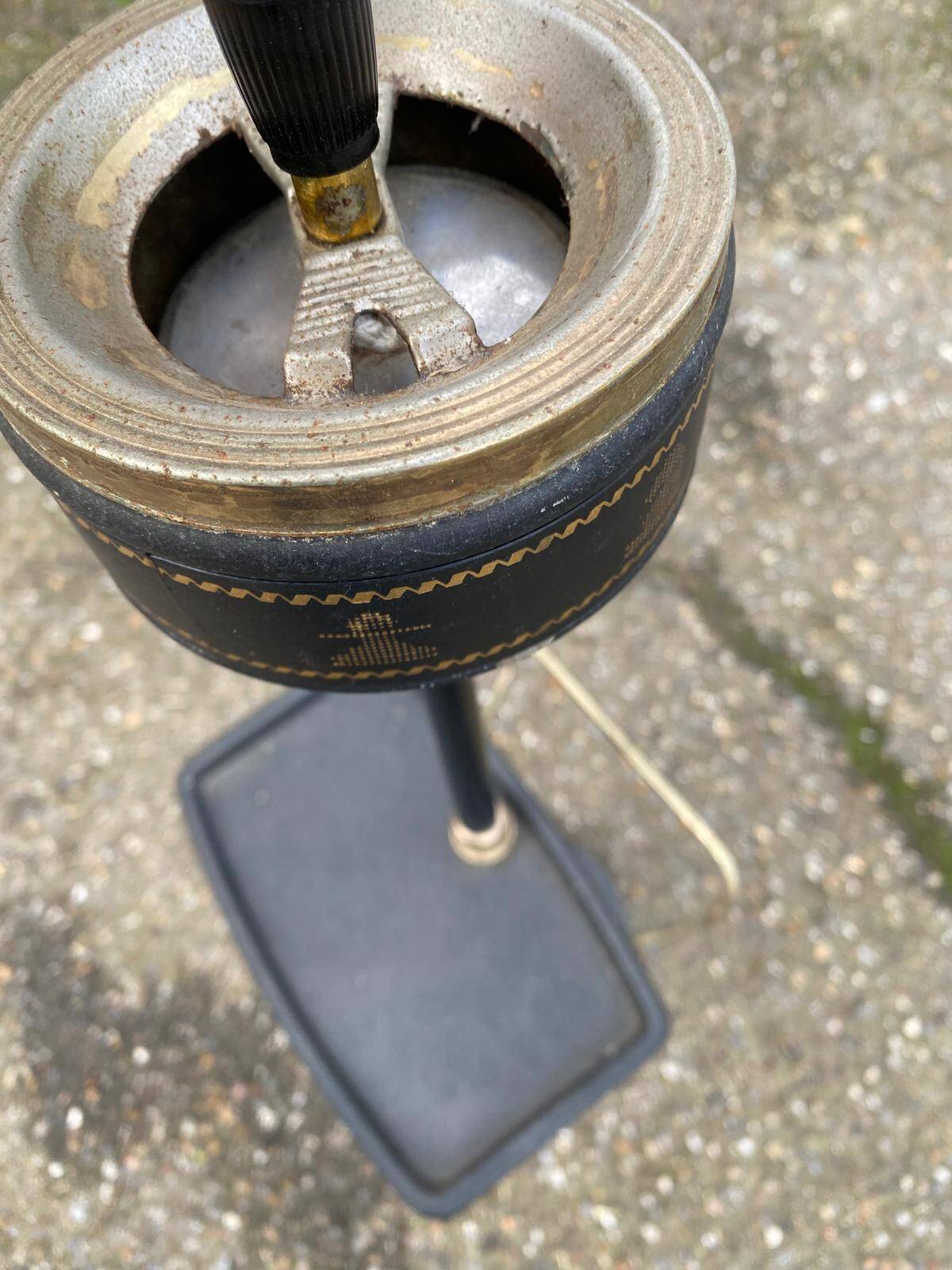 Vintage ashtray on a stand with a magazine holder from the 1960s.