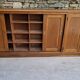 Oak workshop furniture with sliding doors.