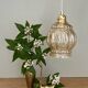 Vintage globe pendant light in bubbled amber glass