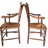 Pair of straw and cherry armchairs