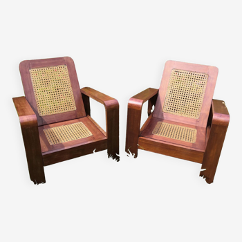 Pair of armchairs in rosewood and canework 1950