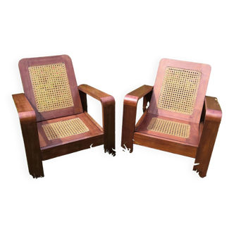 Pair of armchairs in rosewood and canework 1950