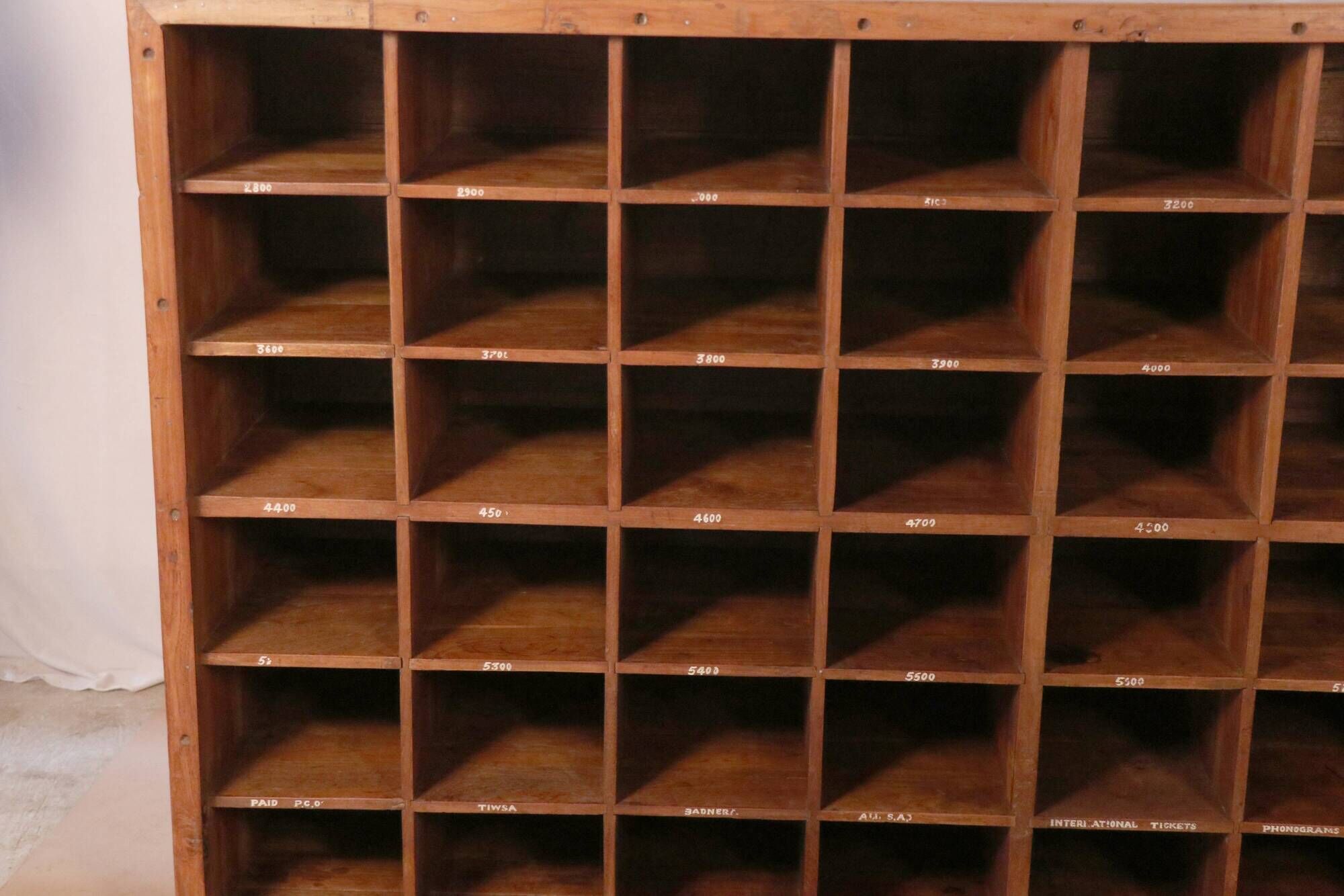 Old professional piece of furniture - postal sorting with 48 lockers in Burmese teak
