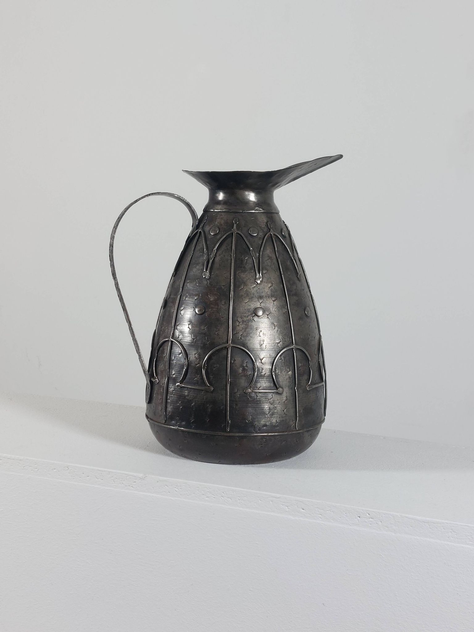 Rare hand-forged metal pitcher and craftsmanship from France.