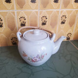 Teapot with flower and wooden handle