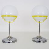 Pair of Space Age table lamps in chromed metal with opaline globe. 1970s