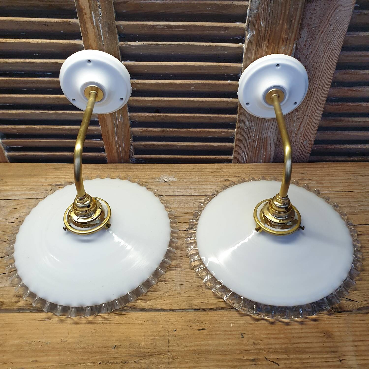 Pleated opaline swan neck wall lights