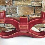 Former pair of burgundy ceramic candlesticks