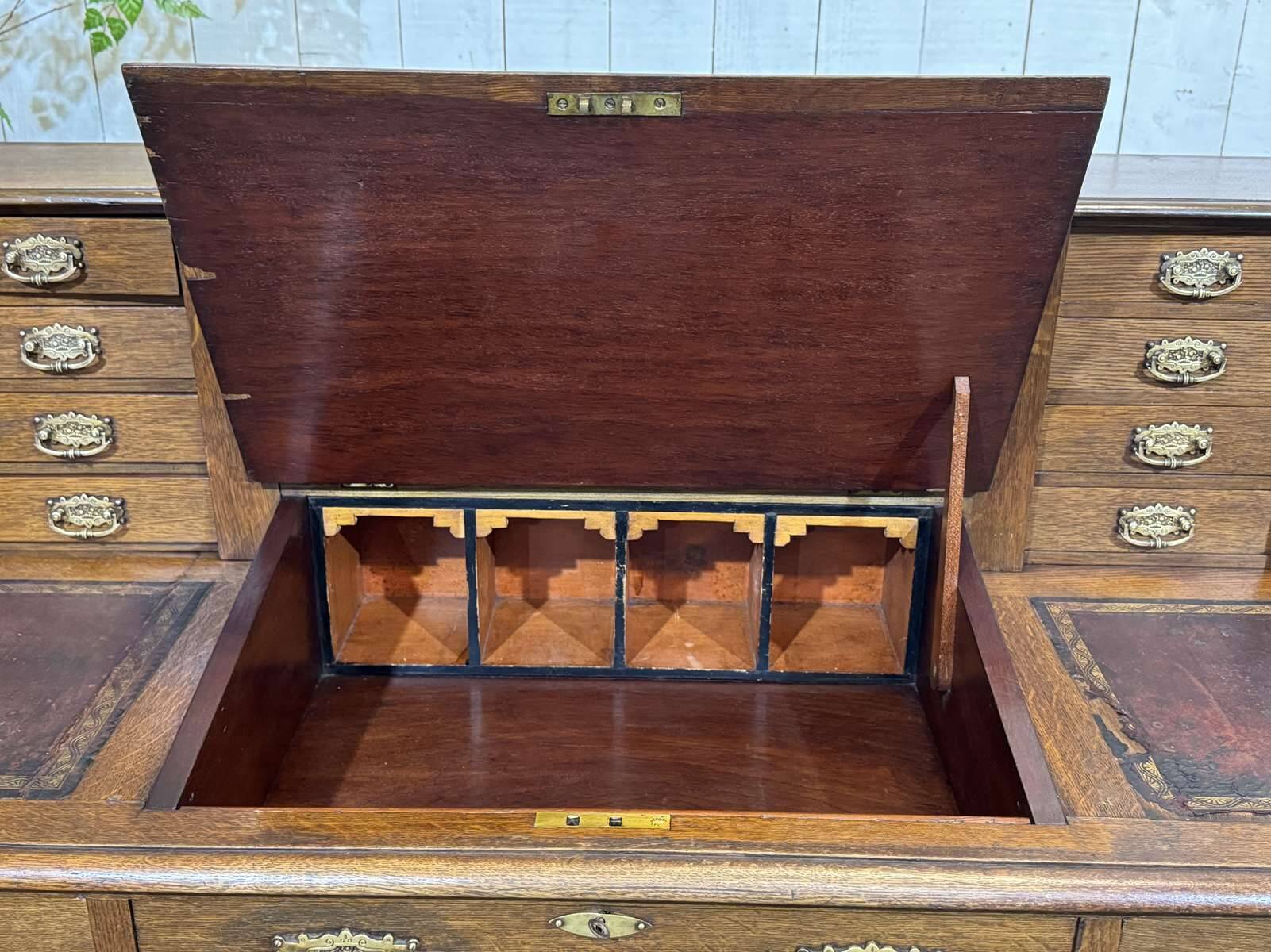 English oak graduated desk from the late 19th century.