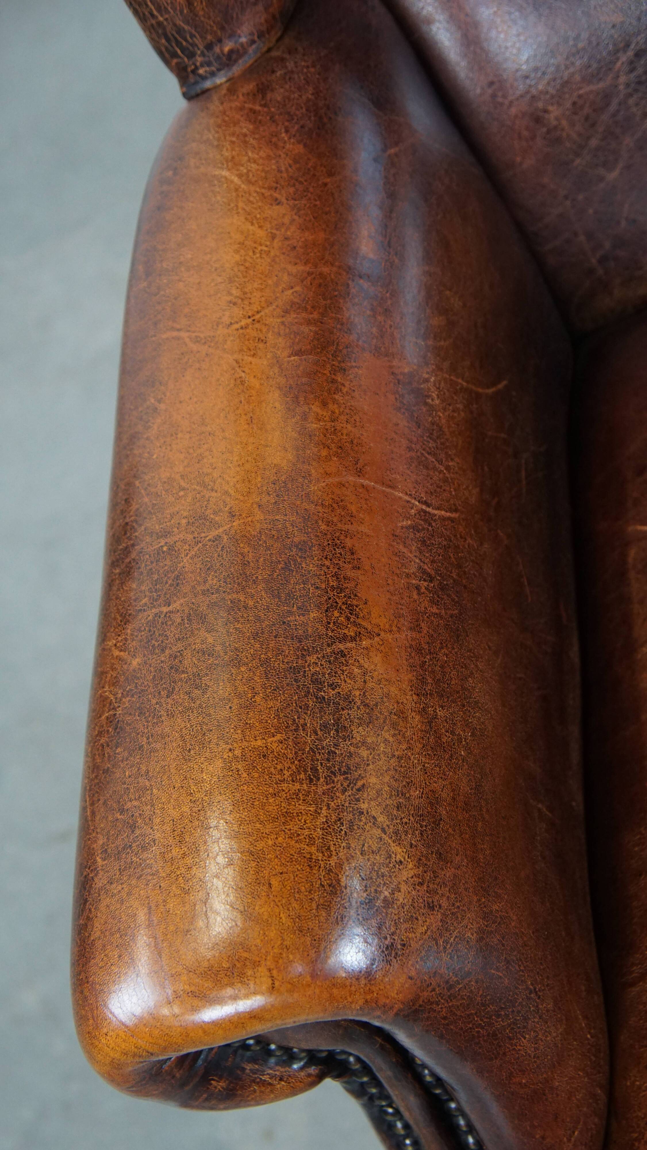 Vintage sheep leather wingback chair