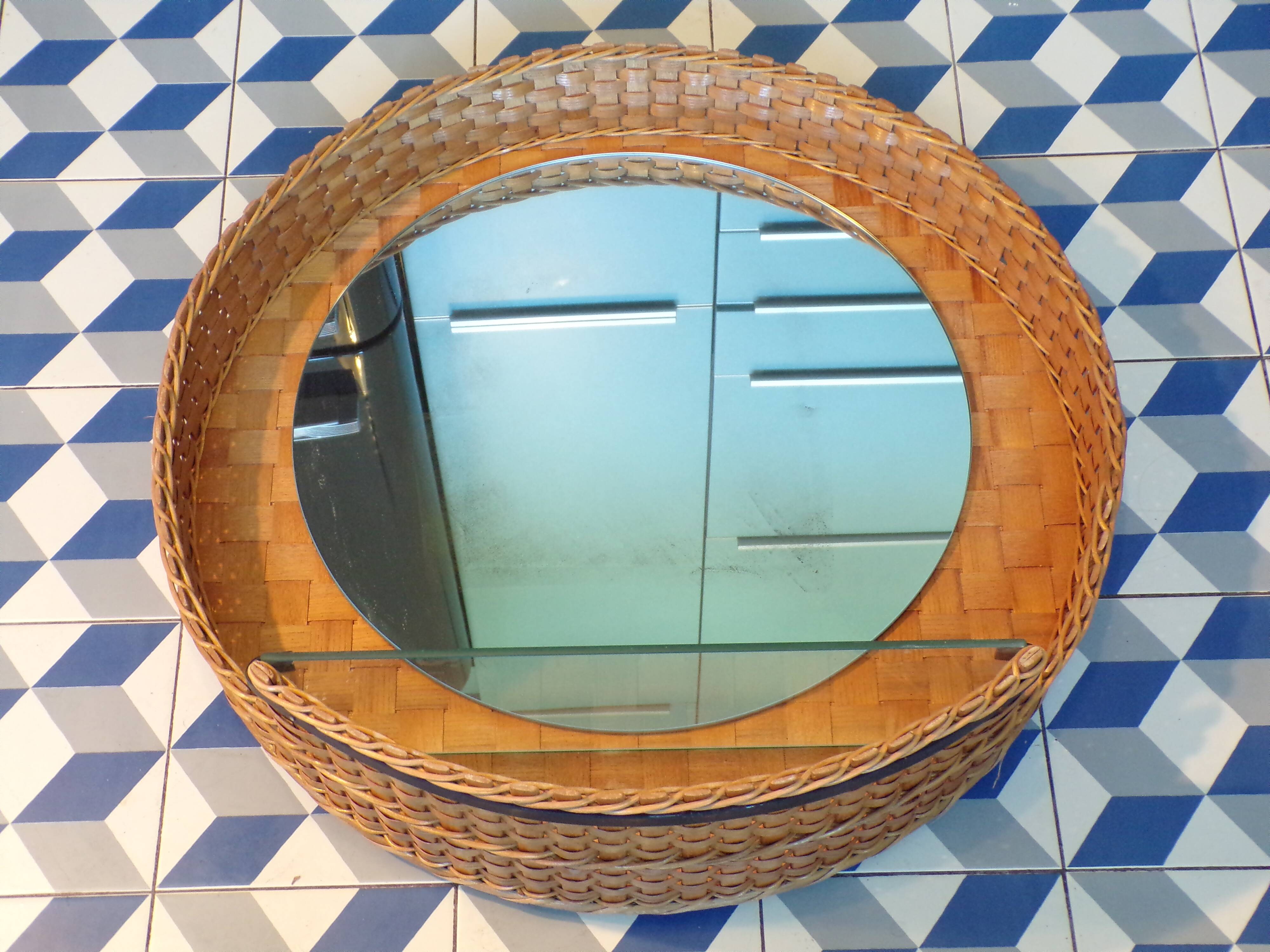 Vintage rattan wall mirror with glass shelf