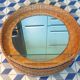 Vintage rattan wall mirror with glass shelf