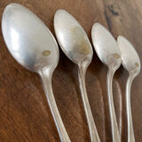4 teaspoons in silver metal